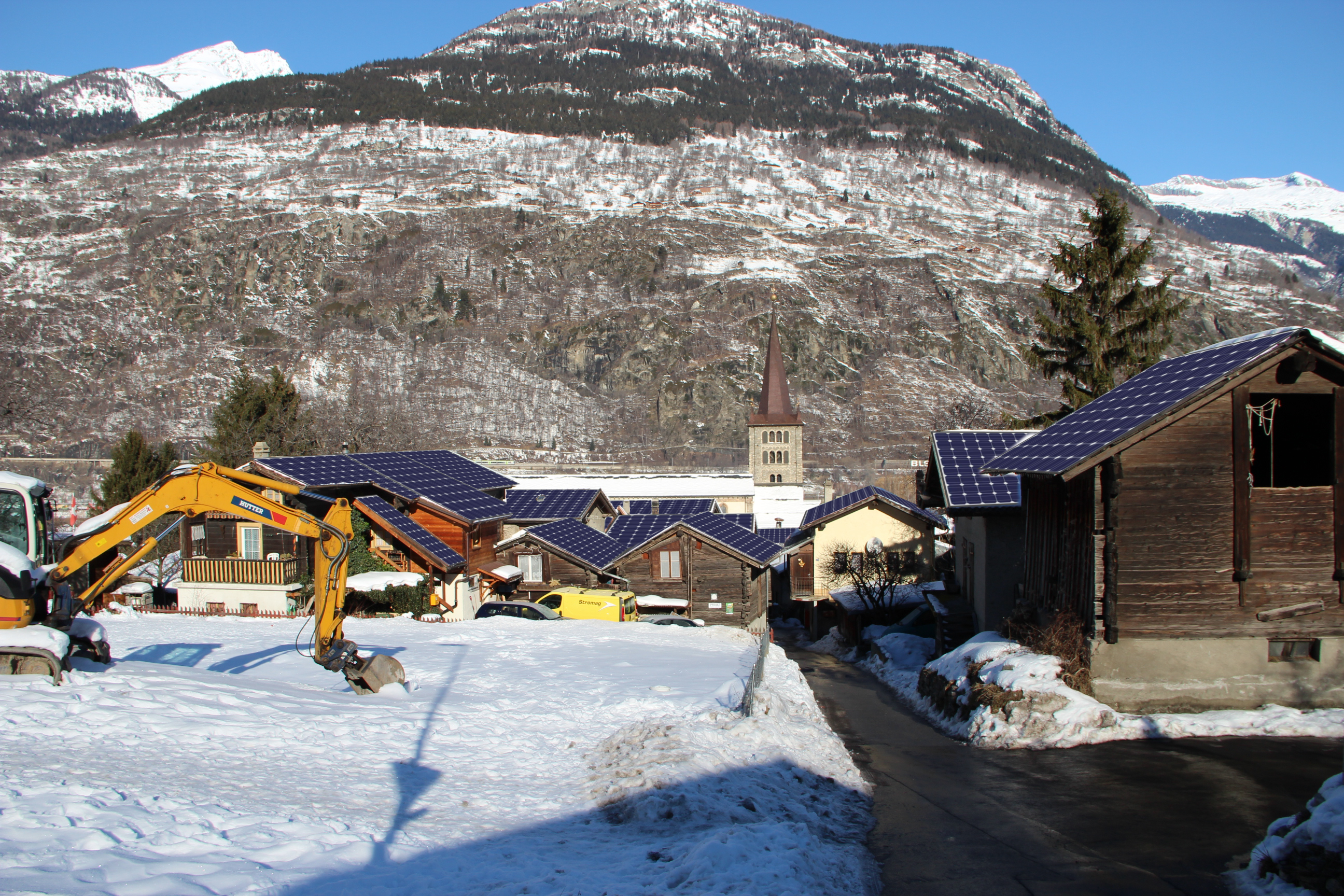 Foto eines dorfes, bei dem ich Solaranlagen mittels Gimp eingefügt habe